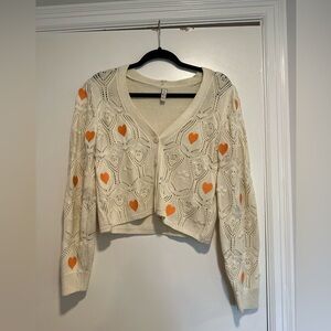Blue Steel Medium Cream Open Knit Button cardigan w/ Orange Embroidered Hearts.